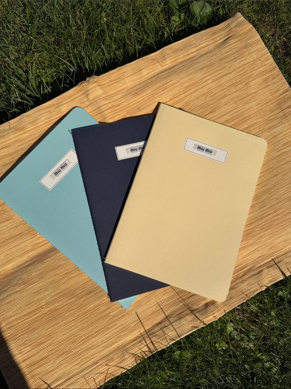 Miu Miu Yellow, light blue & Black , set of three notebooks